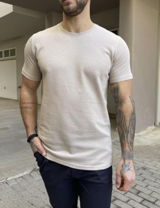 Ανδρικόμονόχρωμο κοντομάνικομπλουζάκι με ανάγλυφο σχέδιο. Διαθέτει στρογγυλή λαιμόκοψη και ίσιο τελείωμα.Σύνθεση: 95% cott. 5% lyc.Εφαρμογή: ΜοντέρναΤο μοντέλο έχει ύψος 1.85 και 90 κιλά. Φοράει μέγεθος XXL