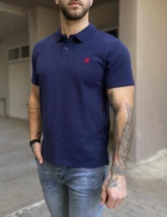 US Grand Polo Ανδρικήπόλοκοντομάνικημπλούζαπικέ. Διαθέτει κουμπιά στον γιακά. Έχει μικρό διακριτικό κέντημα στο στήθος με το λογότυπο.Κανονική εφαρμογή με λίγη ελαστικότηταΣύνθεση: 100% βαμβάκιΤο μοντέλο έχει ύψος 1.85 και 95 κιλά. Φοράει μέγεθος XL