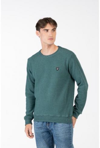 Μακρυμάνικη wool feel μπλούζα με λαιμόκοψη και δερμάτινο patch,της Leo Collection.Το φινίρισμα του ρούχου αγκαλιάζει με πλεκτό ελαστικό ριπ τους καρπούς των χεριών και την μέση ενώ με πλεκτό ριπ έχει επενδυθεί και η λαιμόκοψη του.Ιδανικό για μια προσεγμένη casual εμφάνιση αλλά και για μια πιο ξεχωριστή και ιδιαίτερη βραδινή εμφάνιση,συνδυασμένο με κάποιο από τα αγαπημένα chinos παντελόνια και σακάκια σου.Κατασκευασμένο από σύμικτο ύφασμα(Βαμβάκι 80%,Polyester 20%). Οι μακρυμάνικες μάλλινες μπλούζες είναι μια πρακτική επιλογή που θα σε διευκολύνει στον συνδυασμό με πολλούς τύπους παντελονιών,ενώ θα σε κρατήσει ζεστό τους χειμωνιάτικους μήνες του χρόνου.Ιδανικά συνδυασμένες με ένα πουκάμισο και ένα παντελόνι τζιν για μια ξεχωριστή και άνετη εμφάνιση κατά την διάρκεια της μέρας ,αλλά και ευκολοσυνδύαστες για την βραδινή σου έξοδο ταιριάζοντας τις με σπορ σακάκι,πουκάμισο και παντελόνι τύπου chinos ή πεντάτσεπο καπαρτινέ. Ανεξάρτητα από το πως θα επιλέξεις να τις συνδυάσεις,οι βαμβακερές μακρυμάνικες μπλούζες είναι η πλέον ιδανική και μοντέρνα επιλογή και ένα must για την γκαρνταρόμπα σου.