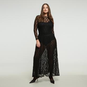 Ρομαντική και σύγχρονη, αυτή η μαύρη μάξι φούστα από δαντέλα αποπνέει ανεπιτήδευτη κομψότητα. Η απαλή ελαστική δαντέλα αγκαλιάζει το σώμα και δημιουργεί ρευστή κίνηση με διακριτική διαφάνεια. Συνδυάστε τη με ένα εφαρμοστό τοπ για εντυπωσιακή βραδινή εμφάνιση ή με ένα πλεκτό για εκλεπτυσμένο καθημερινό στυλ. ● Από απαλή ελαστική δαντέλα ● Ημιδιάφανη δαντελένια υφή για θηλυκό και κομψό αποτέλεσμα ● Ελαστική μέση για άνεση και τέλεια εφαρμογή ● Αέρινη γραμμή που ακολουθεί όμορφα τις κινήσεις του σώματος ● Ιδανική για βραδινές εμφανίσεις ή για layering σε πιο casual looks Μήκος: 105 εκ. 92%POLYAMIDE 8%ELASTANE Το μοντέλο έχει ύψος 1,80 εκ. και φοράει S Made in Greece 