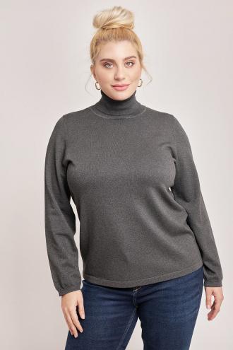 Πλεκτή μπλούζα από μιξ βισκόζης με lurex. Γιακάς ζιβάγκο και μακριά μανίκια. Ριπ λεπτομέρεια στην λαιμόκοψη και την μανσέτα. Το μοντέλο έχει ύψος 177εκ, στήθος 110, μέση 85, περιφέρεια 115 και φοράει μέγεθος S